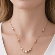 Elegant 18K Rose Gold Pearl Statement Drop Necklace Women Long Chain Cream Pearl Accents Sophisticated Jewelry Gift